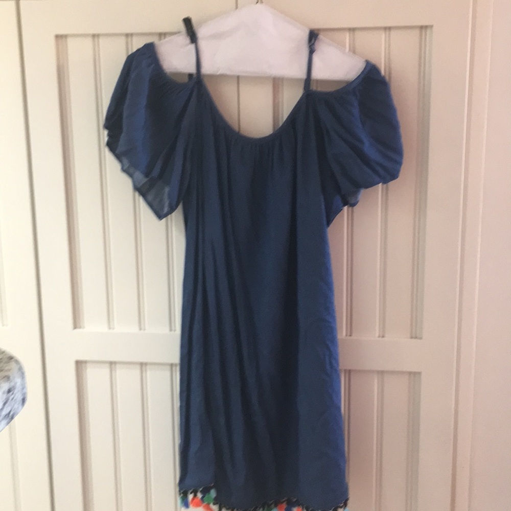 Denim Dress with Multi color fringe at the bottom.